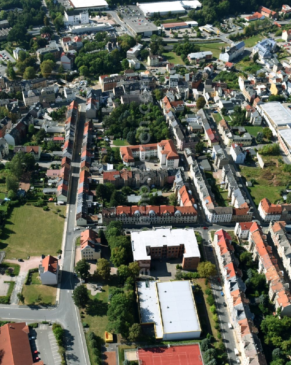 Aerial image Werdau - City view of downtown area along the Ziegelstrasse and the Alexan der-von-Humboldt-Strasse with the school building of the Gymnasium Alexan der v. Humboldt in Werdau in the state Saxony