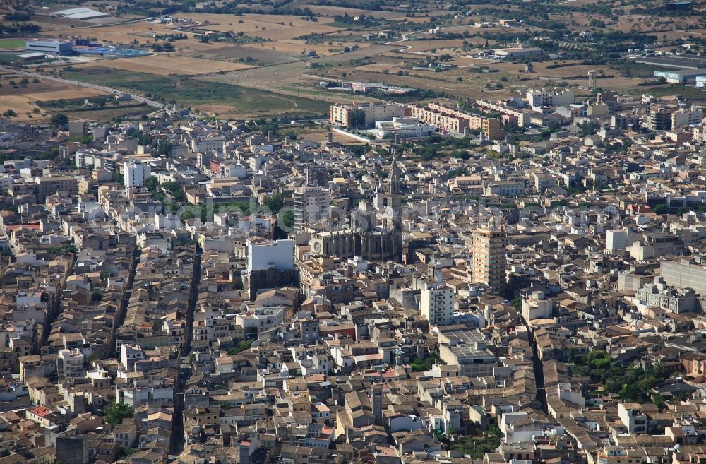 Aerial photograph Manacor - City view of downtown area Manacor with church Nostra Senyora dels Dolors in Mallorca in Balearic Islands, Spain