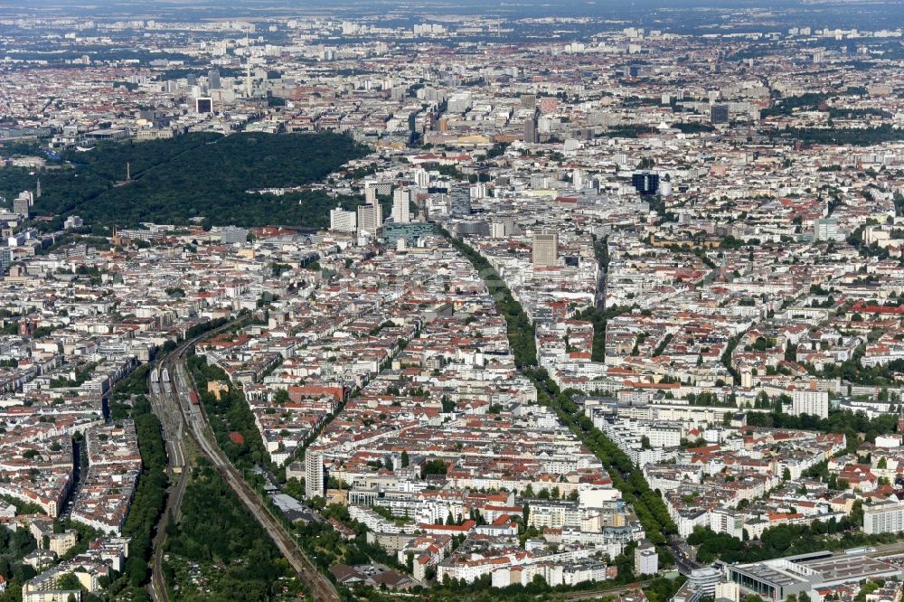 Berlin from above - City view of downtown area Mitte in Berlin including Tiergarten, Potsdamer Platz und Leipziger Platz. Additional the districts of Charlottenburg, Wilmersdorf, Schoeneberg, Neukoelln, Mitte, Kreuzberg