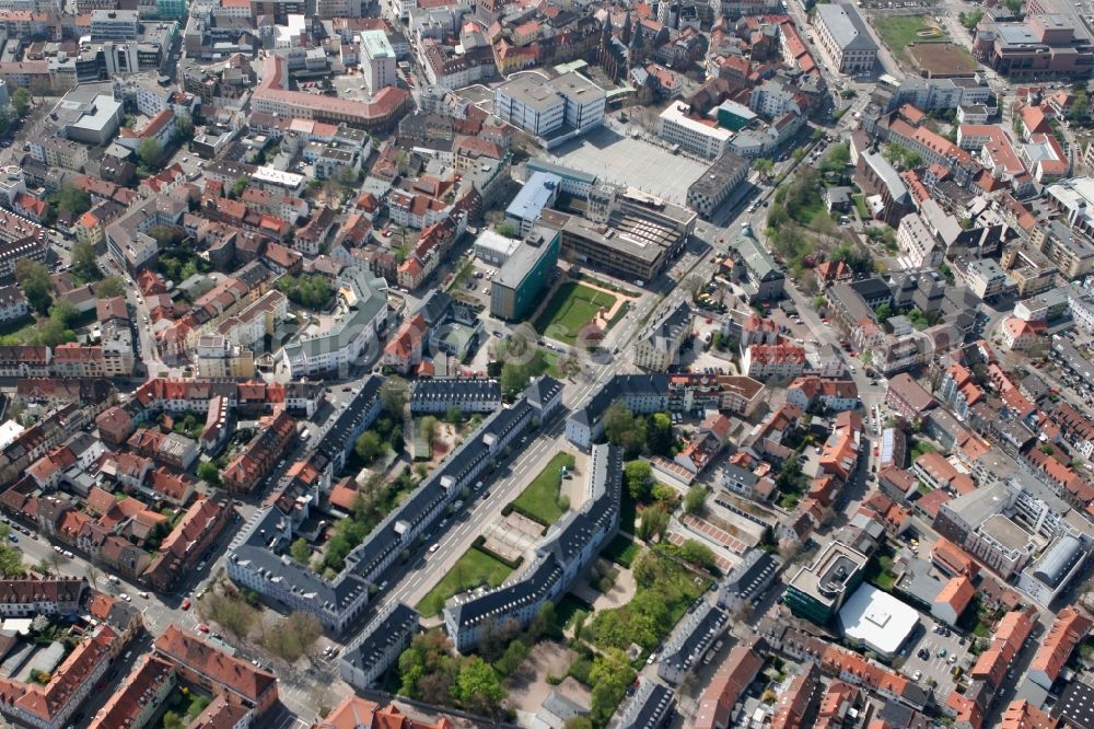 Kaiserslautern from above - Cityscape of Kaiserslautern with the Stiftsplatz Square in the state of Rhineland-Palatinate. The square is one of the central squares in downtown Kaiserlautern. It is framed by several buildings in the North, South and West. The gothic abbey with its three distinct towers is located in the Southwest and the L-shaped white building of Deutsche Bank is standing adjacent to it