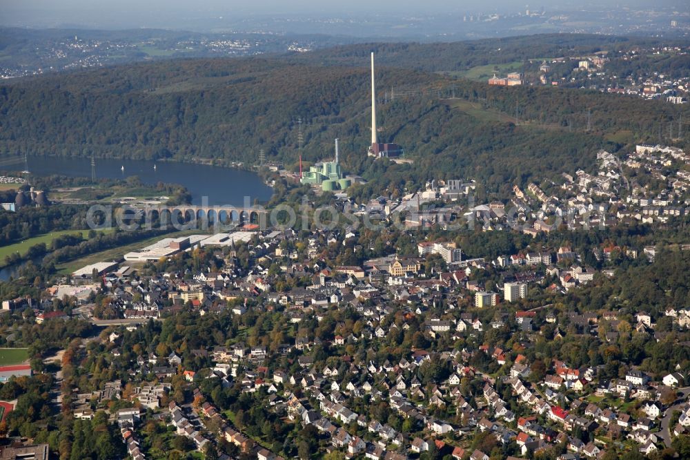 Herdecke from above - Cityscape and the Cuno power station of Herdecke in the state of North Rhine-Westphalia. The power station was built in 1908 as a heating plant. It is located on Lake Harkortsee, a barrier lake of the Ruhr river. The funnel - Cuno - is widely visible and considered a landmark of Herdecke. Deconstruction of the site started in 2005. The Ruhr viaduct is close to the power plant