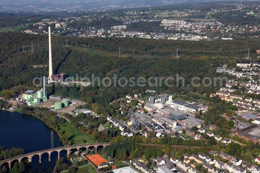 Herdecke from the bird's eye view: Cityscape and the Cuno power station of Herdecke in the state of North Rhine-Westphalia. The power station was built in 1908 as a heating plant. It is located on Lake Harkortsee, a barrier lake of the Ruhr river. The funnel - Cuno - is widely visible and considered a landmark of Herdecke. Deconstruction of the site started in 2005. The Ruhr viaduct is close to the power plant