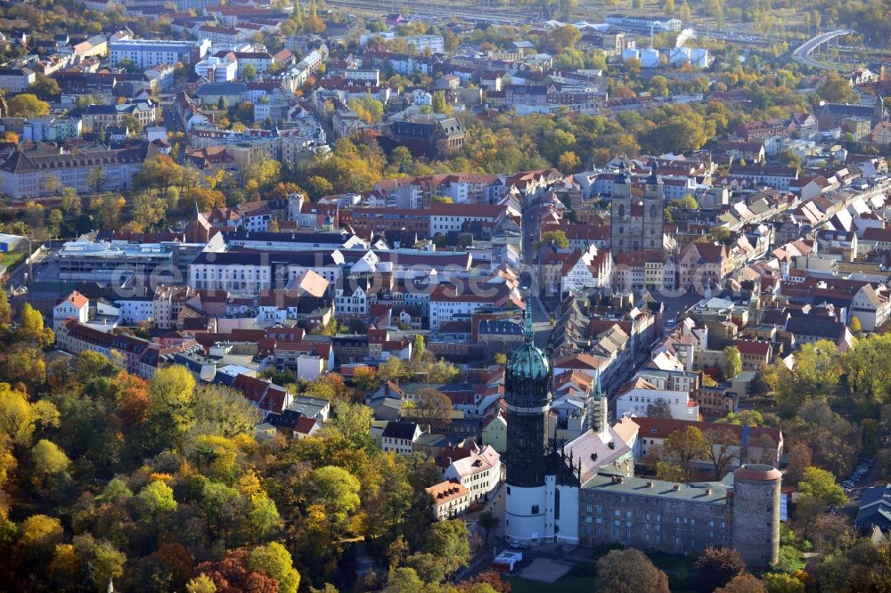 Lutherstadt Wittenberg from above - Cityscape of Lutherstadt Wittenberg in the state Saxony-Anhalt. You can see the Castle of Wittenberg with the appropriate castle church Allerheiligen (All Hallows). The castle and the church are world heritage sites of the UNESCO