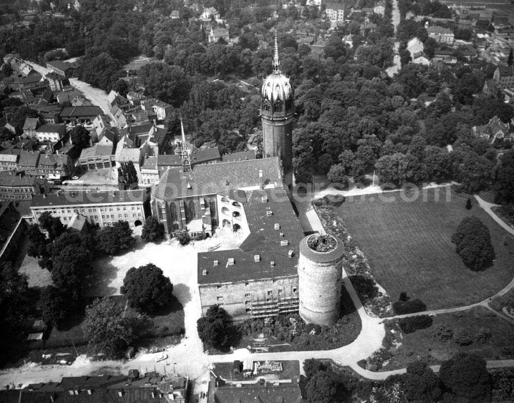 Lutherstadt Wittenberg from above - Cityscape of Lutherstadt Wittenberg in the state Saxony-Anhalt. You can see the Castle of Wittenberg with the appropriate castle church Allerheiligen (All Hallows). The castle and the church are world heritage sites of the UNESCO