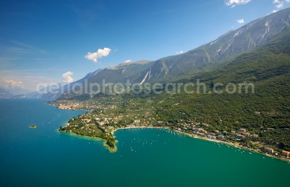 Aerial image Malcesine - City view of Malcesine with a lot of hotels at the Garda sea in Veneto, Italy