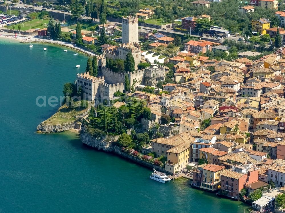 Aerial photograph Malcesine - City view of Malcesine with the castle Castello di Malcesine at the Garda sea in Veneto, Italy