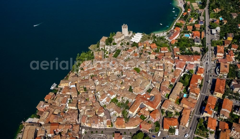 Aerial photograph Malcesine - City view of Malcesine with the castle Castello di Malcesine at the Garda sea in Veneto, Italy