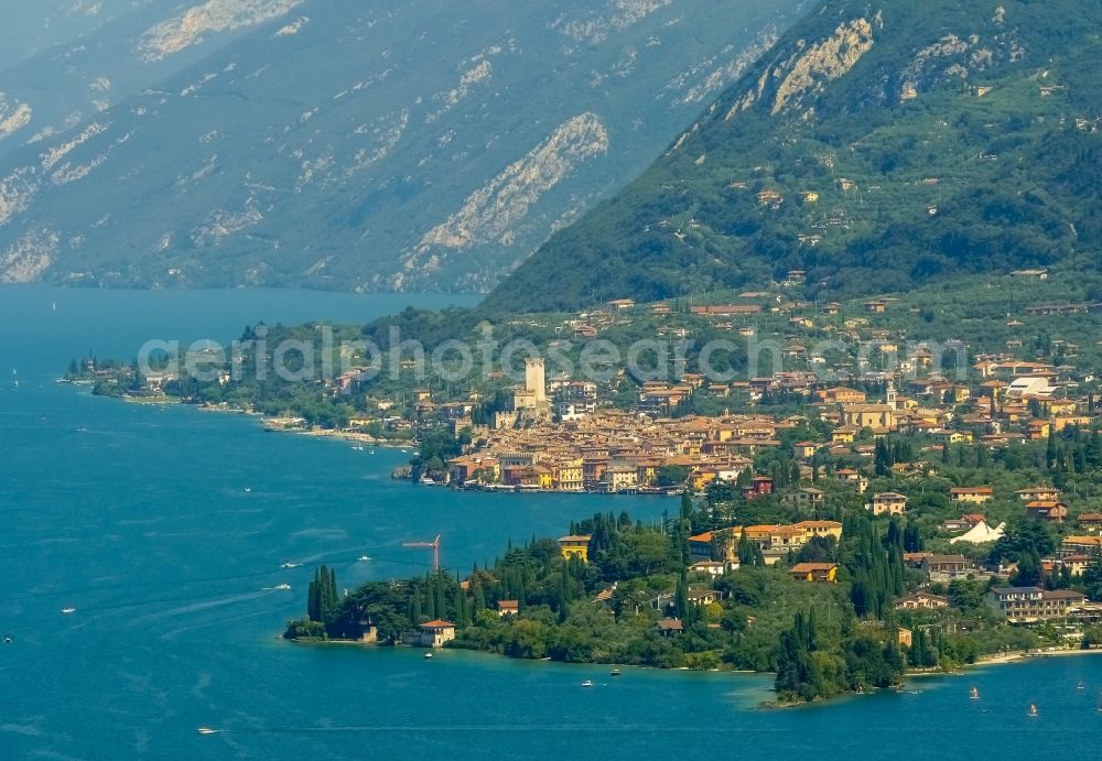 Malcesine from the bird's eye view: City view of Malcesine with the castle Castello di Malcesine at the Garda sea in Veneto, Italy