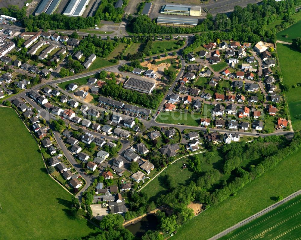 Aerial image Montabaur - View of the town of Montabaur in the state Rhineland-Palatinate. The official tourist resort is the seat of administration of the county district of Westerwald. The town is an economic centre of the region and know for its castle and train station