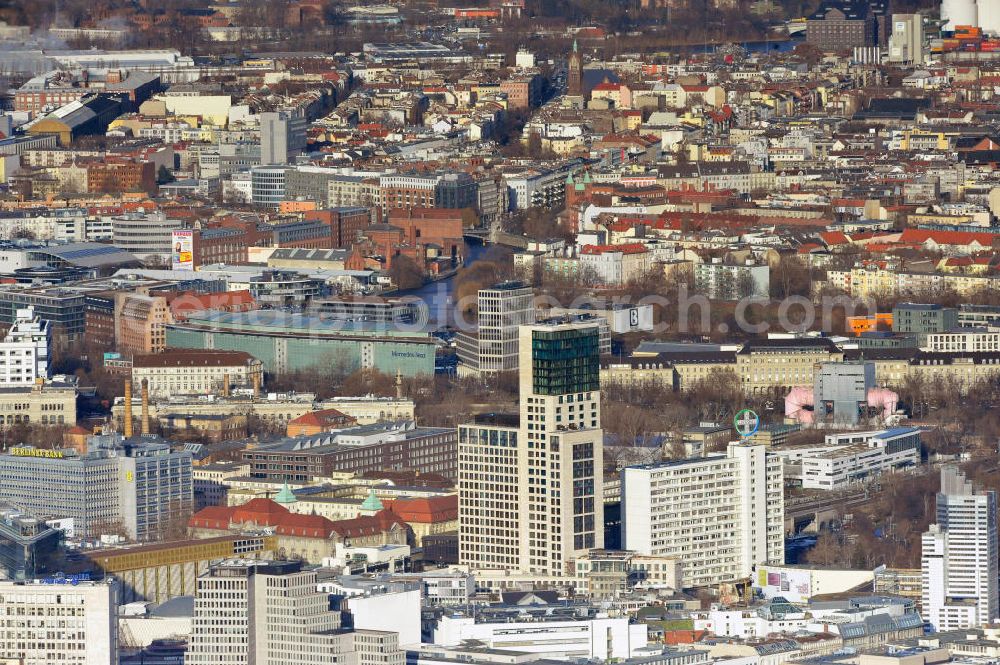 Aerial photograph Berlin - Stadtansicht mit dem neu errichteten Hochhaus Zoofenster in der City West in Charlottenburg am Bahnhof ZOO. Das die Skyline West wie das Europacenter prägende Hochhausprojekt mit 118 Meter Höhe wird neben Einzelhandelsläden in den unteren Geschossen hauptsächlich ein Hotel der Marke Waldorf-Astoria beherbergen und soll Ende 2011 durch die ALPINE Bau fertiggestellt werden. City view with the newly constructed high-rise Zoofenster in the City West train station Charlottenburg ZOO.