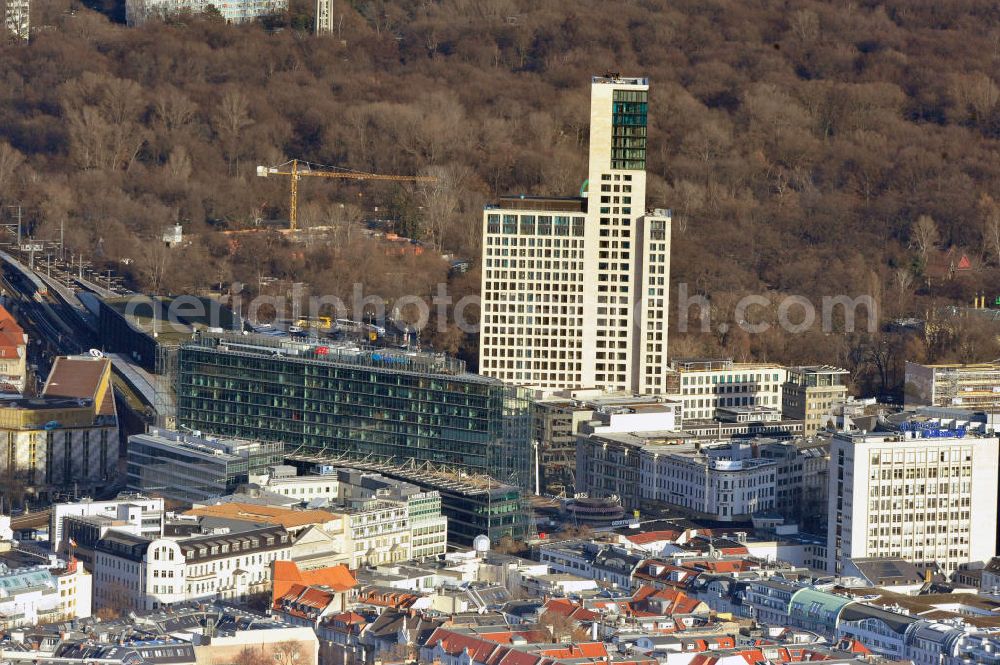 Berlin from above - Stadtansicht mit dem neu errichteten Hochhaus Zoofenster in der City West in Charlottenburg am Bahnhof ZOO. Das die Skyline West wie das Europacenter prägende Hochhausprojekt mit 118 Meter Höhe wird neben Einzelhandelsläden in den unteren Geschossen hauptsächlich ein Hotel der Marke Waldorf-Astoria beherbergen und soll Ende 2011 durch die ALPINE Bau fertiggestellt werden. City view with the newly constructed high-rise Zoofenster in the City West train station Charlottenburg ZOO.