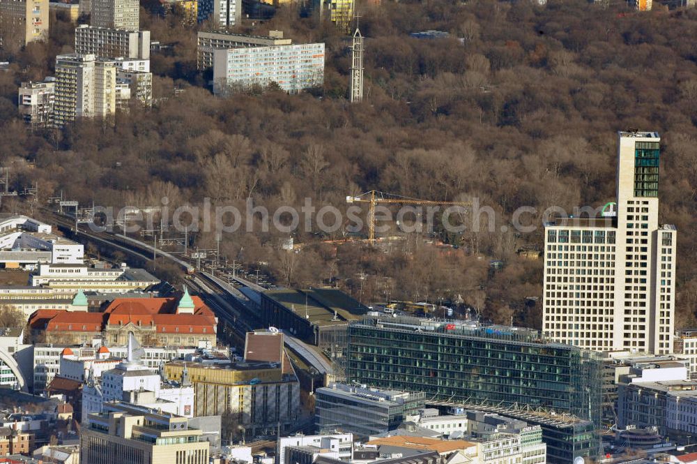 Aerial photograph Berlin - Stadtansicht mit dem neu errichteten Hochhaus Zoofenster in der City West in Charlottenburg am Bahnhof ZOO. Das die Skyline West wie das Europacenter prägende Hochhausprojekt mit 118 Meter Höhe wird neben Einzelhandelsläden in den unteren Geschossen hauptsächlich ein Hotel der Marke Waldorf-Astoria beherbergen und soll Ende 2011 durch die ALPINE Bau fertiggestellt werden. City view with the newly constructed high-rise Zoofenster in the City West train station Charlottenburg ZOO.