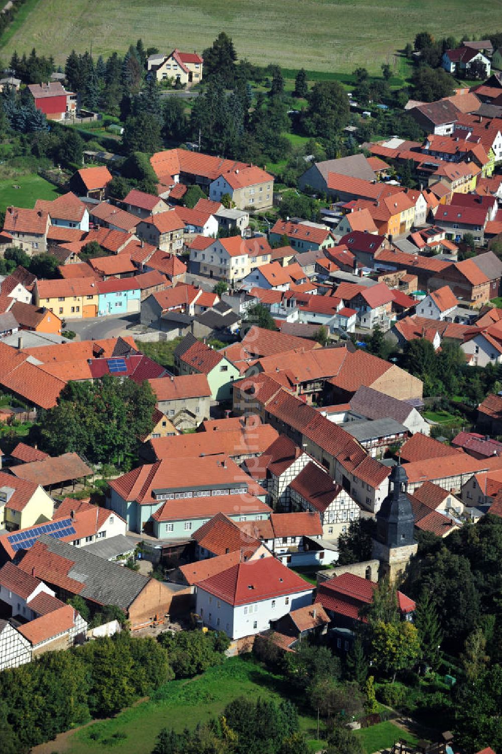 Aerial image Neunheilingen - Village resp. small town Neunheilingen with the Ruins of the Church of the Holy Cross in Thuringia