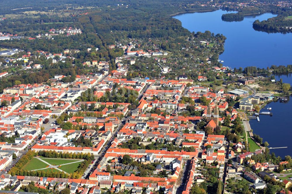 Neuruppin from above - Stadtansicht der Fontane - Stadt Neuruppin in Brandenburg. Neuruppin ist die Kreisstadt des brandenburgischen Landkreises Ostprignitz-Ruppin. Zum Gedenken an den in Neuruppin geborenen Dichter Theodor Fontane trägt die Stadt den Beinamen Fontanestadt. City view of Neuruppin. The poet Theodor Fontane was born in Neuruppin, so it is called Fontanestadt Neuruppin.