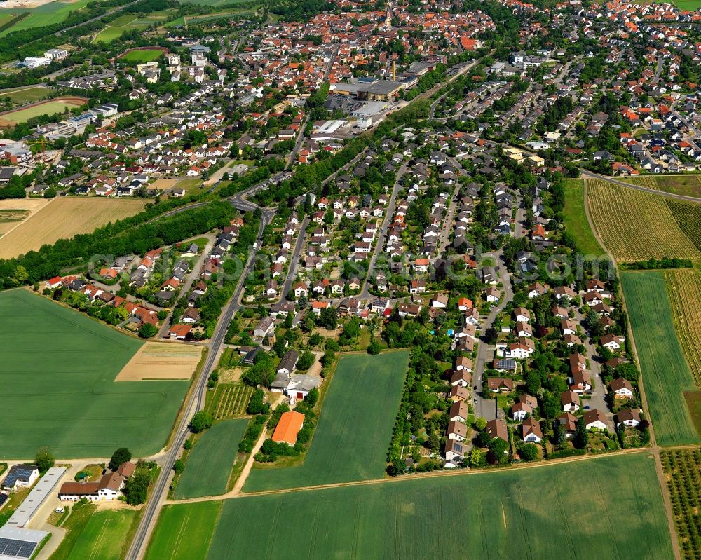 Nieder-Olm from above - Townscape of Nieder-Olm in the state of Rhineland-Palatinate. Nieder-Olm is located in the Mainzer Becken (flatlands) region and is characterised by wine-growing estates and fruit cultivation. View from the South to the town centre