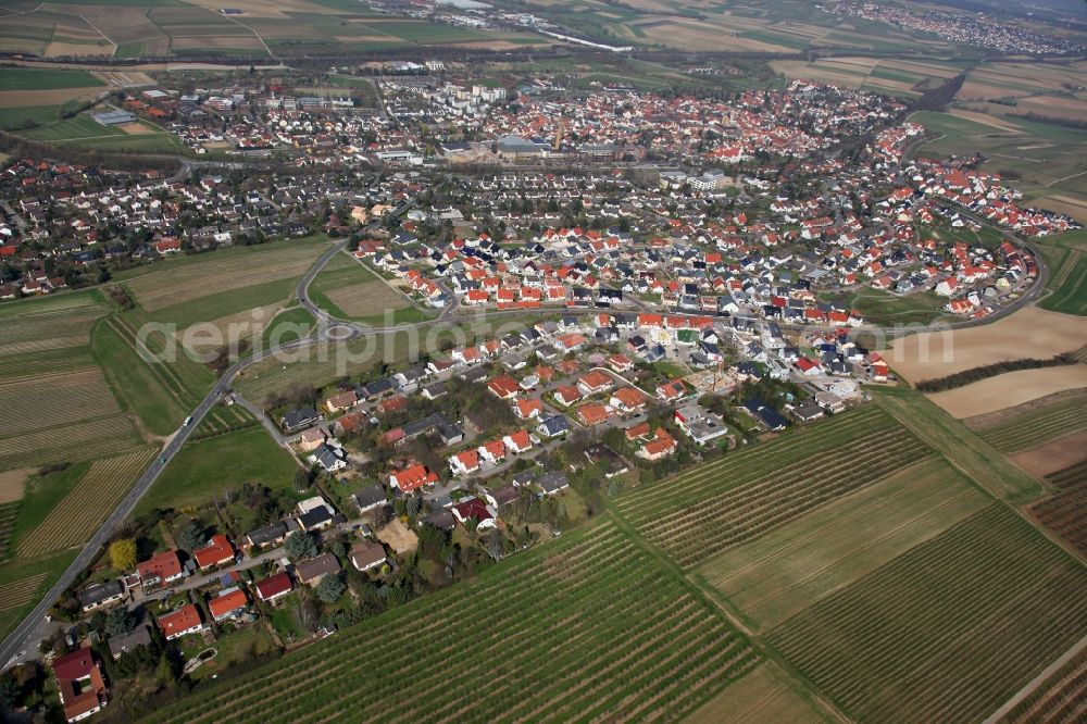 Aerial image Nieder-Olm - View of Nieder-Olm in the state Rhineland-Palatinate. The town is located in the county district of Mainz-Bingen, in the region of Mainzer Becken. The urban area consists of wooded residential areas and single family houses and is surrounded by fields. Nieder-Olm is located adjacent to the federal motorway A63 and includes a wide industrial area in the West of the town