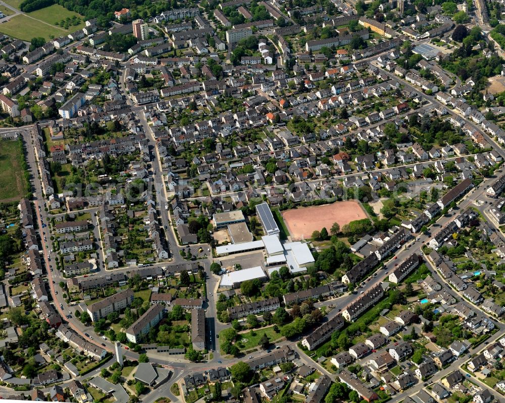 Aerial image Andernach - View of the East of downtown Andernach in the state of Rhineland-Palatinate. The town is located in the county district of Mayen-Koblenz on the left riverbank of the river Rhine. The town is characterised by industry, consists of five boroughs and districts and belongs to the oldest towns in Germany. The east of Andernach is characterised by residential blocks and estates and is home to the grammar and public school St. Stephan with its outdoor sports facilities