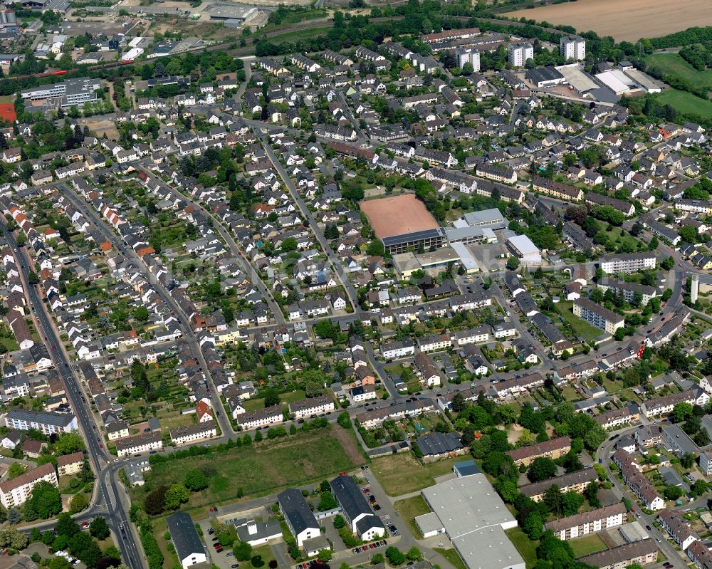 Aerial image Andernach - View of the East of downtown Andernach in the state of Rhineland-Palatinate. The town is located in the county district of Mayen-Koblenz on the left riverbank of the river Rhine. The town is characterised by industry, consists of five boroughs and districts and belongs to the oldest towns in Germany. The east of Andernach is characterised by residential blocks and estates and is home to the grammar and public school St. Stephan with its outdoor sports facilities