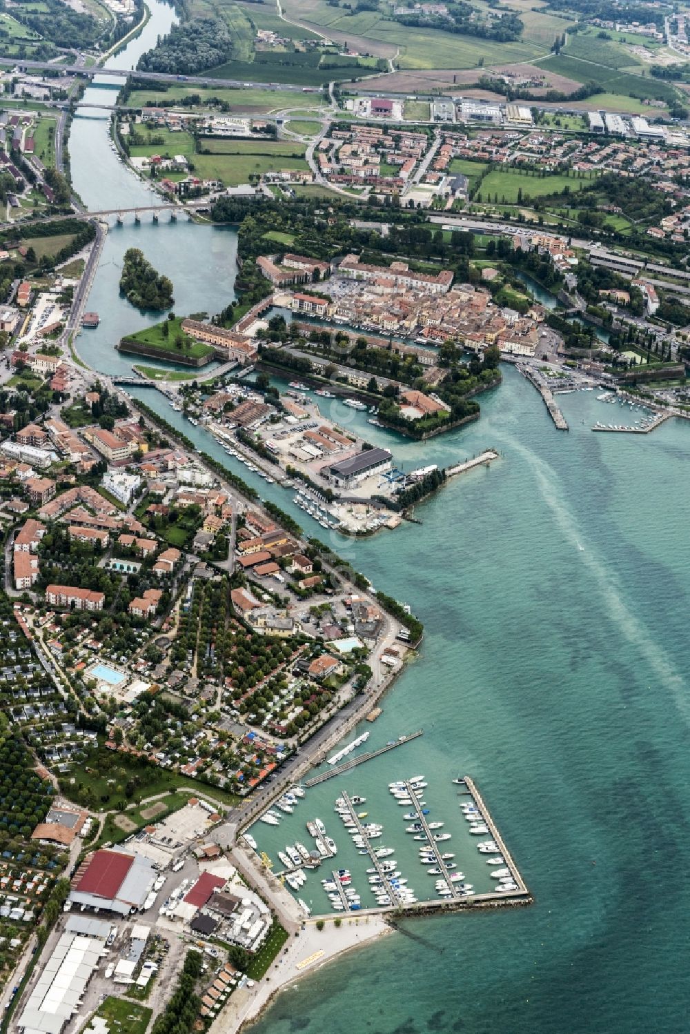 Aerial photograph Peschiera del Garda - City view of Peschiera del Garda in the province Verona in Italy. The City is locaded at the southern bank of the Gardasee. Also the Mincio river flows into the Gardasee