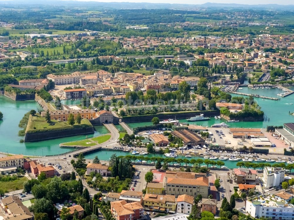 Peschiera del Garda from above - City view of Peschiera del Garda in the province Verona in Italy. The City is locaded at the southern bank of the Gardasee. Also the Mincio river flows into the Gardasee