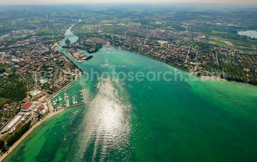 Aerial image Peschiera del Garda - City view of Peschiera del Garda in the province Verona in Italy. The City is locaded at the southern bank of the Gardasee. Also the Mincio river flows into the Gardasee