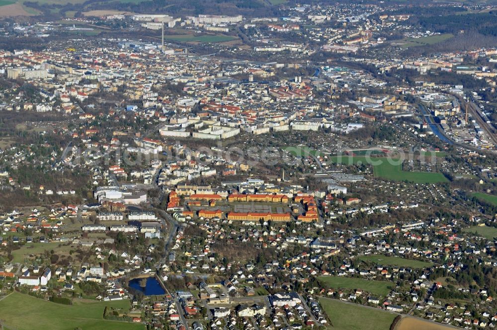 Aerial photograph Plauen - Cityscape of Plauen in Saxony. Plauen is the greatest city in the Vogtland. In the center of the image seen striking the grounds of the former East German NVA Officer College of the East German border guards Rosa Luxembourg, which is now used as part of a conversion process as a commercial center