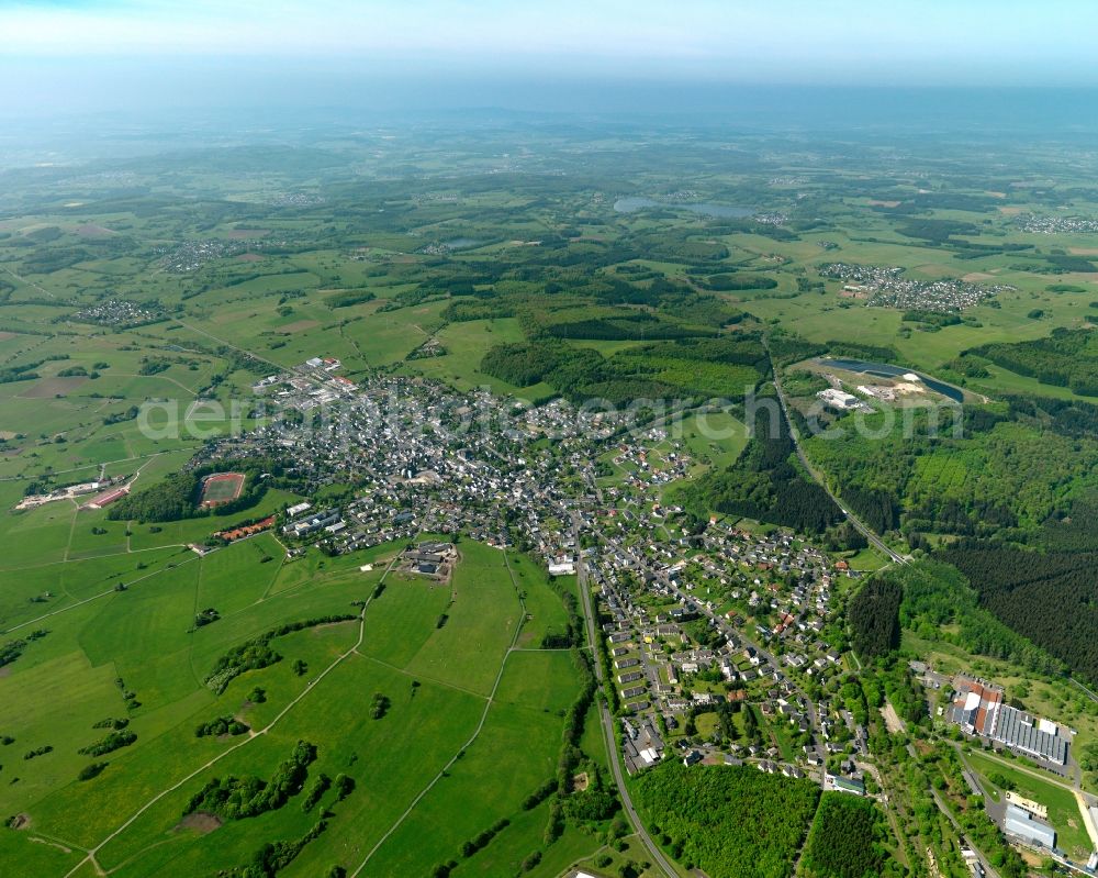 Rennerod from above - View of the town of Rennerod in the state of Rhineland-Palatinate. The town is located in the Westerwald region and county district on federal highway B54. It is surrounded by industrial areas, agricultural fields and meadows