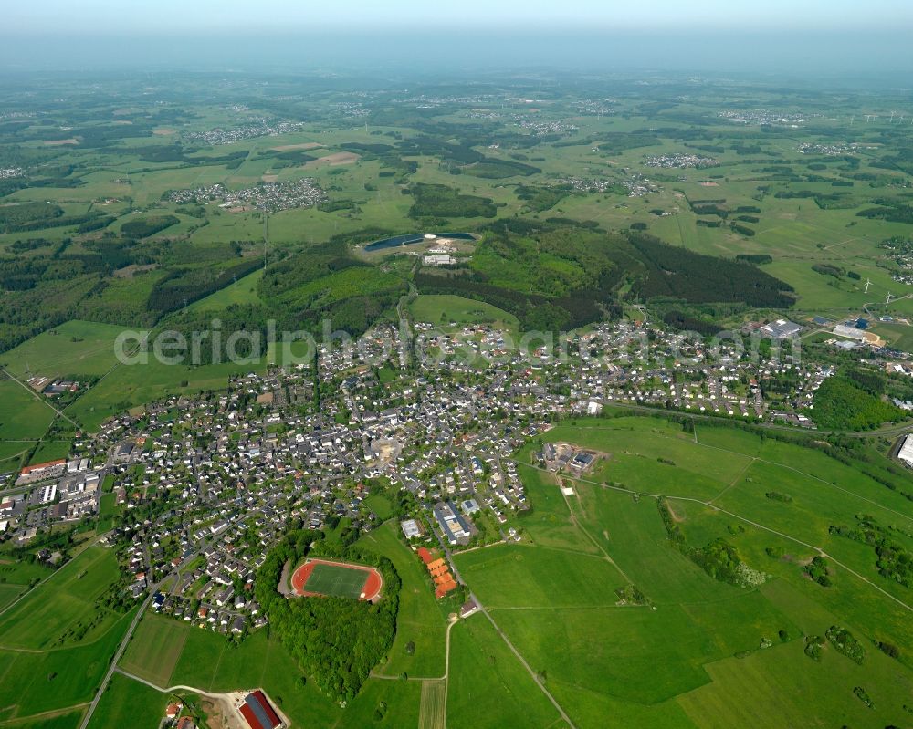 Rennerod from the bird's eye view: View of the town of Rennerod in the state of Rhineland-Palatinate. The town is located in the Westerwald region and county district on federal highway B54. It is surrounded by industrial areas, agricultural fields and meadows