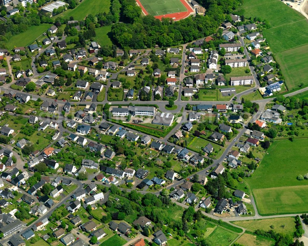 Aerial image Rennerod - View of the town of Rennerod in the state of Rhineland-Palatinate. The town is located in the Westerwald region and county district on federal highway B54. It is surrounded by industrial areas, agricultural fields and meadows