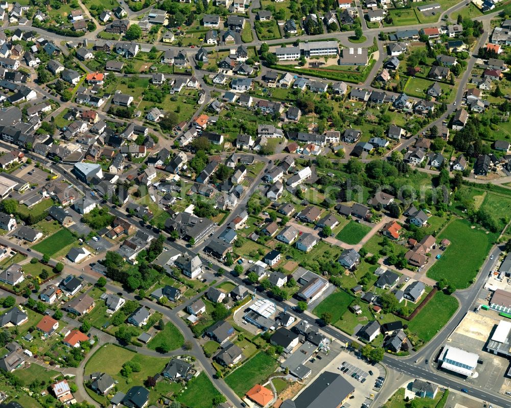 Aerial photograph Rennerod - View of the town of Rennerod in the state of Rhineland-Palatinate. The town is located in the Westerwald region and county district on federal highway B54. It is surrounded by industrial areas, agricultural fields and meadows