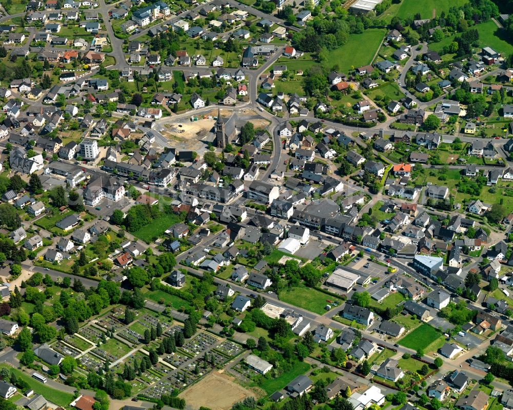 Rennerod from the bird's eye view: View of the town of Rennerod in the state of Rhineland-Palatinate. The town is located in the Westerwald region and county district on federal highway B54. It is surrounded by industrial areas, agricultural fields and meadows