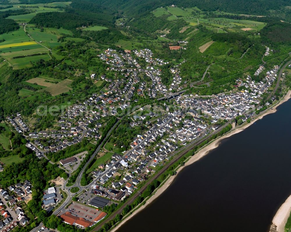 Rhens from above - View of Rhens in the state Rhineland-Palatinate. The town is located in the county district of Mayen-Koblenz on the Western shore of the river Rhine. The official tourist resort is crossed by the federal highway B9 and sits in the UNESCO world heritage site of Upper Middle Rhine Valley