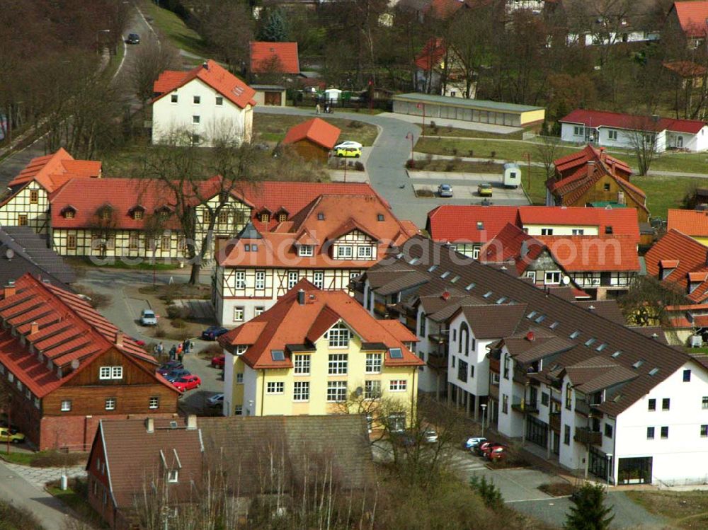 Rottleberode from the bird's eye view: Rottleberode liegt im Landkreis Sangerhausen, an der westlichen Grenze des Landes Sachsen-Anhalt, am Rande des Südharzes, im Tal der Thyra. Der kleine Ort hat 1.813 Einwohner. Gemeinde Rottleberode, Hüttenhof 1, 06548 Rottleberode, Tel.: 034653 - 2 72, Fax: 034653 - 4 50