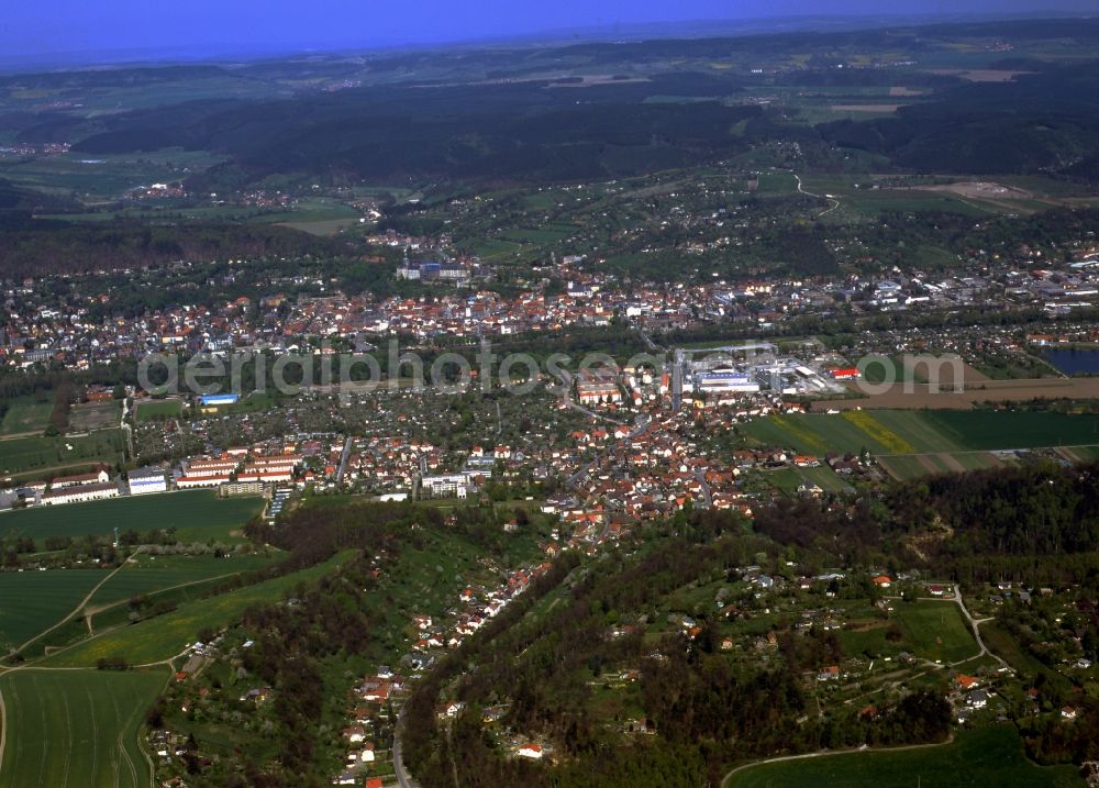 Aerial image Rudolstadt - Rudolstadt in Thuringia is located on the Saale. The major attraction of the historic city is the former residence Heidecksburg in which the Thuringian State Museum is housed. Below the castle dominates the town church of St. Andrew from the sea of the old town