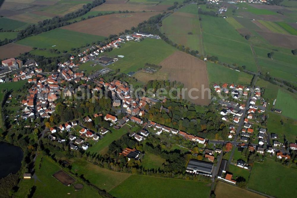 Aerial image Schweinsberg - Blick auf Schweinsberg als Stadtteil von Stadtallendorf. Diese ist eine hessische Mittelstadt im Landkreis Marburg-Biedenkopf, die 18 km östlich von Marburg liegt.