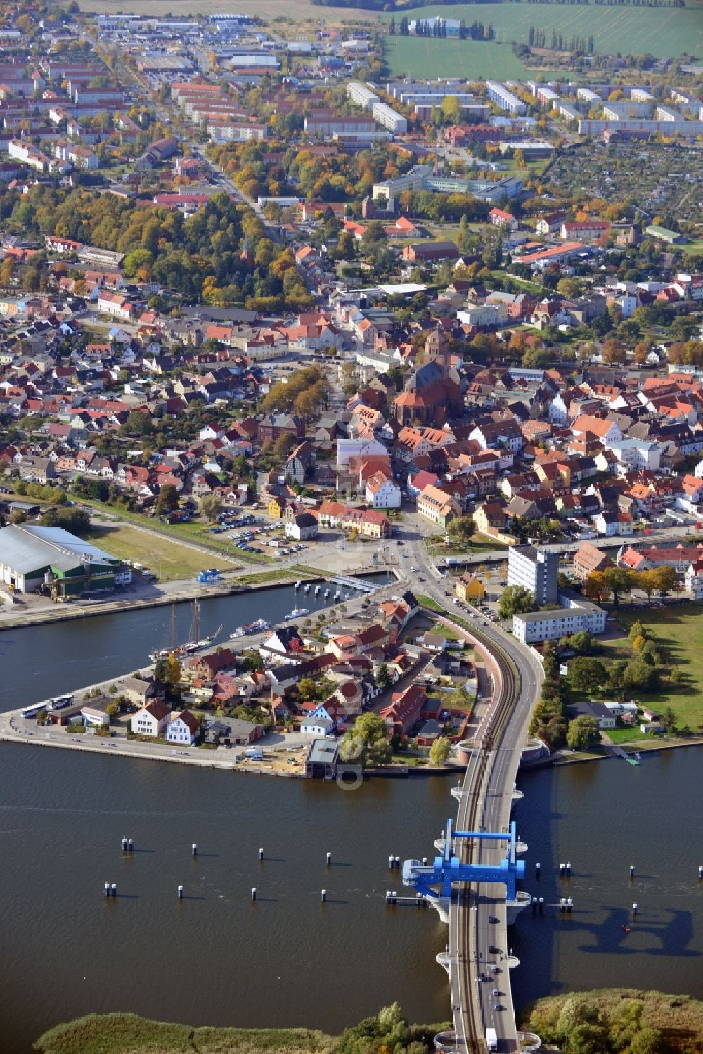 Aerial image Wolgast - Cityscape of Wolgast in the state Mecklenburg-Vorpommern. Furthermore ou can see the Peene Bridge. It is a bascule bridge and crosses the Peenestream. The bridge bears the name Bridge of friendship