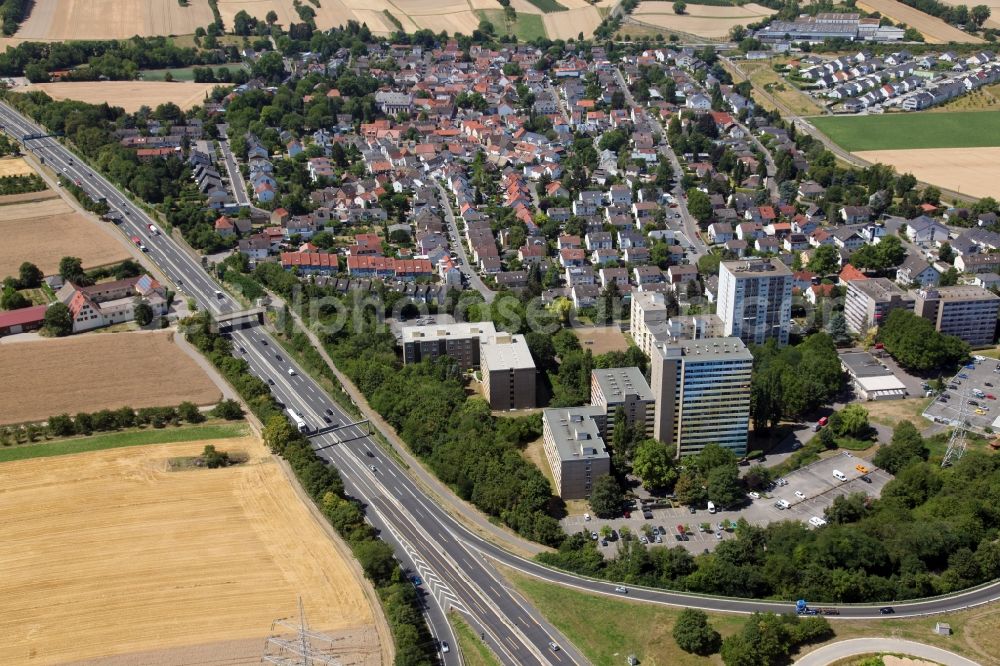 Mainz from the bird's eye view: District in the city in the district Marienborn in Mainz in the state Rhineland-Palatinate, Germany. In the foreground some skyscrapers, directly next to the motorways A60 and A63