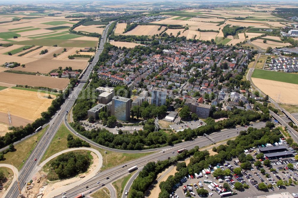 Aerial photograph Mainz - District in the city in the district Marienborn in Mainz in the state Rhineland-Palatinate, Germany. In the foreground some skyscrapers, directly next to the motorways A60 and A63