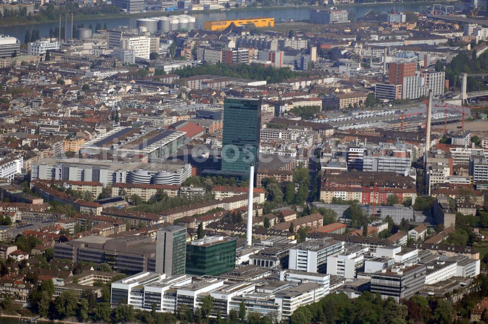 Basel from the bird's eye view: Stadtansicht Basel. Im Vordergrund Die Firma Hoffmann La Roche, Kontakt Medienstelle: Grenzacherstrasse 124, CH-4070 Basel, Tel. +41 (0)61 688 8888, Fax +41 (0)61 691 9391, E-Mail: basel.mediaoffice@roche.com. Im Hintergrund das Messegelände Basel mit Messeturm, Kontakt: MCH Messe Schweiz (Basel) AG, CH-4005 Basel, Tel. +41 (0)58 200 2020, Fax +41 (0)58 206 2194, info@messe.ch