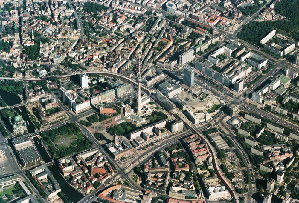 Aerial photograph Berlin - City view from the city center at the East Berlin television tower in Alexanderplatz, Berlin Hotel (now Holiday Inn), Kaufhof. Also pictured on the left the Marx-Engels Forum on the Spree and the Palace of the Republic, Red Town Hall and Nikolai Quarter