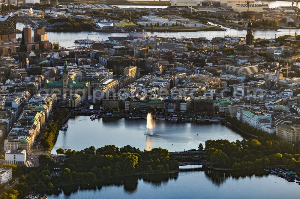 Hamburg from above - City view of the city center at the town hall in the sunset / Alsterhaus on Jungfernstieg on the banks of the Inner Alster in Hamburg