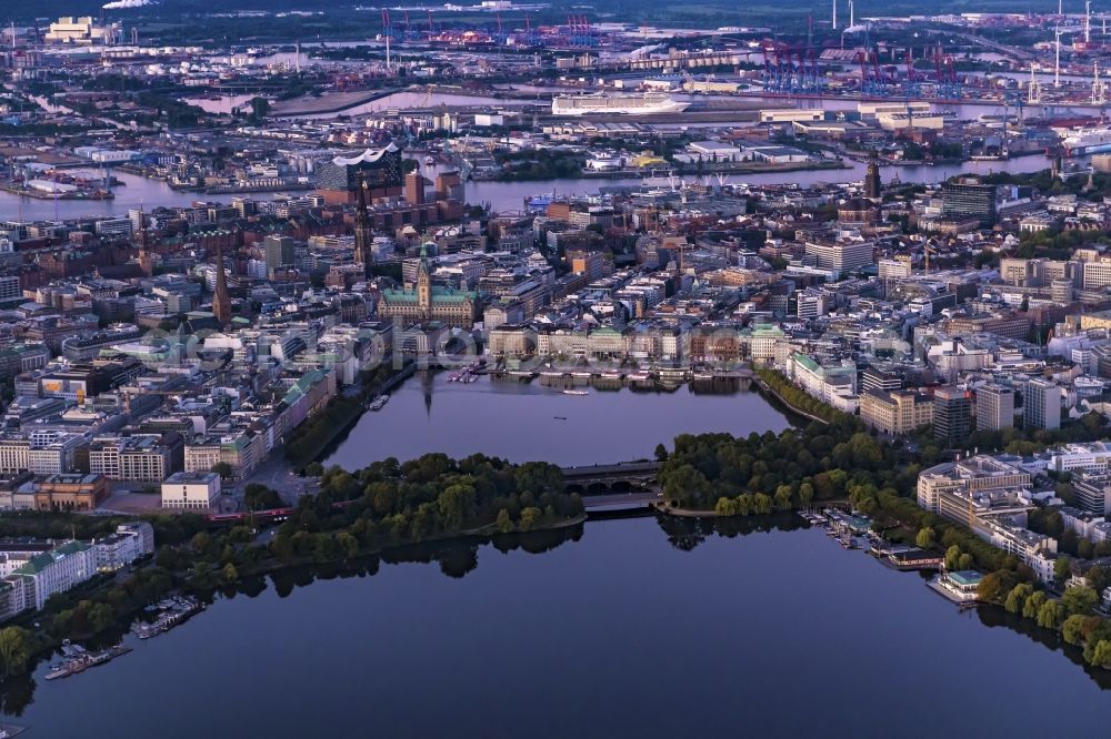 Hamburg from above - City view of the city center at the town hall in the sunset / Alsterhaus on Jungfernstieg on the banks of the Inner Alster in Hamburg