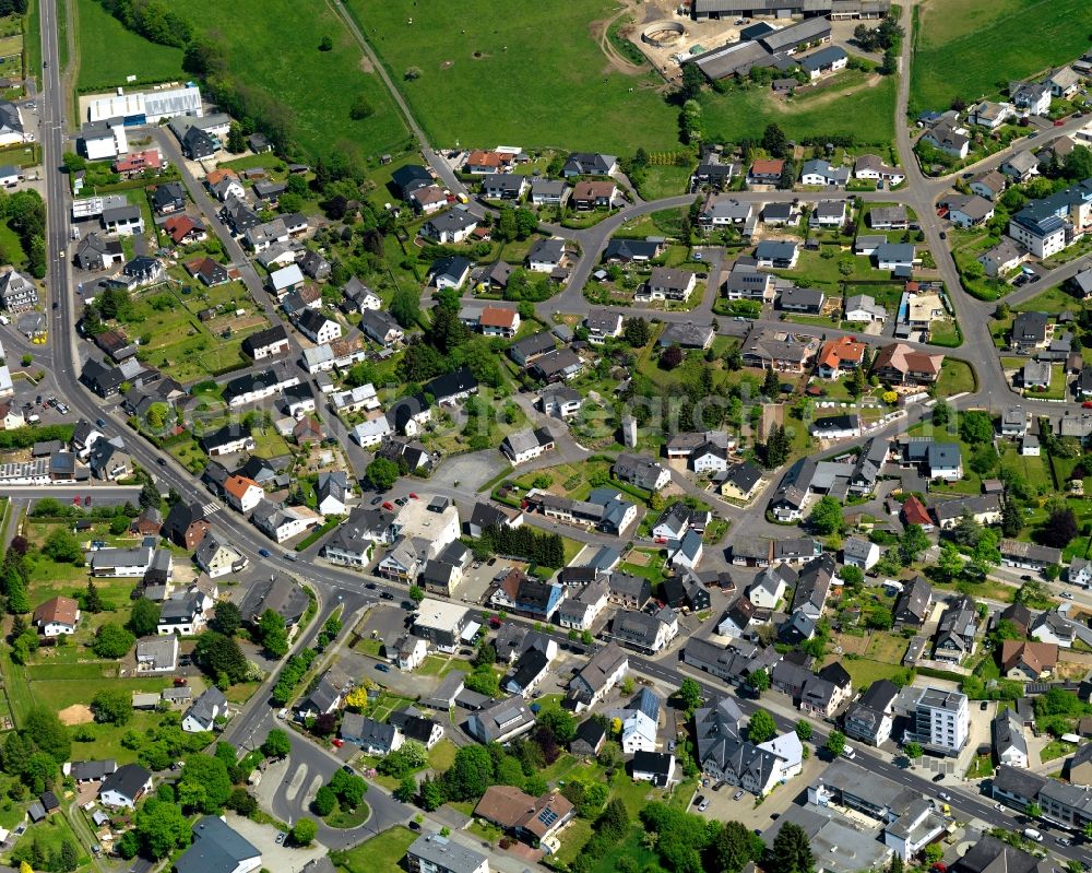 Aerial photograph Rennerod - View of the town centre of Rennerod in the state of Rhineland-Palatinate. The town is located in the Westerwald region and county district on federal highway B54. It is surrounded by industrial areas, agricultural fields and meadows