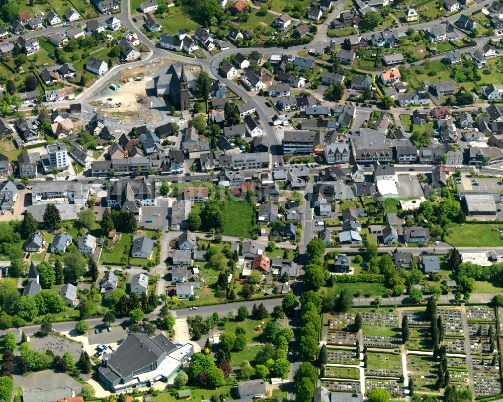 Rennerod from above - View of the town centre of Rennerod in the state of Rhineland-Palatinate. The town is located in the Westerwald region and county district on federal highway B54. It is surrounded by industrial areas, agricultural fields and meadows