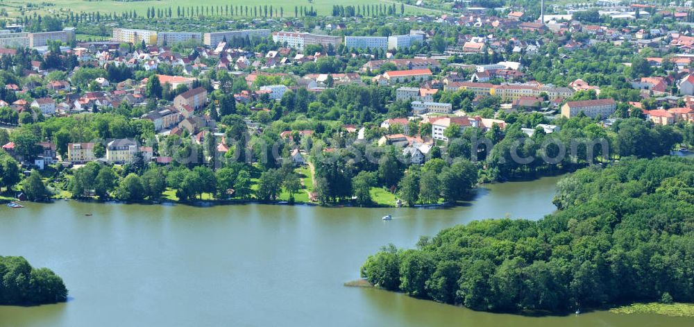 Templin from above - Stadtansicht der Kreisstadt Templin im Landkreis Uckermark im Land Brandenburg. Sie liegt am Stadtsee Templin / Templiner See. Der See gehört zum Naturpark Uckermärkische Seen.Townscape of Templin in the administrative district Uckermark in Brandenburg. It is situated at the riverside of the Stadtsee Templin / Templiner lake. the lake belongs to the natural preserve Uckermaerkische Seen.