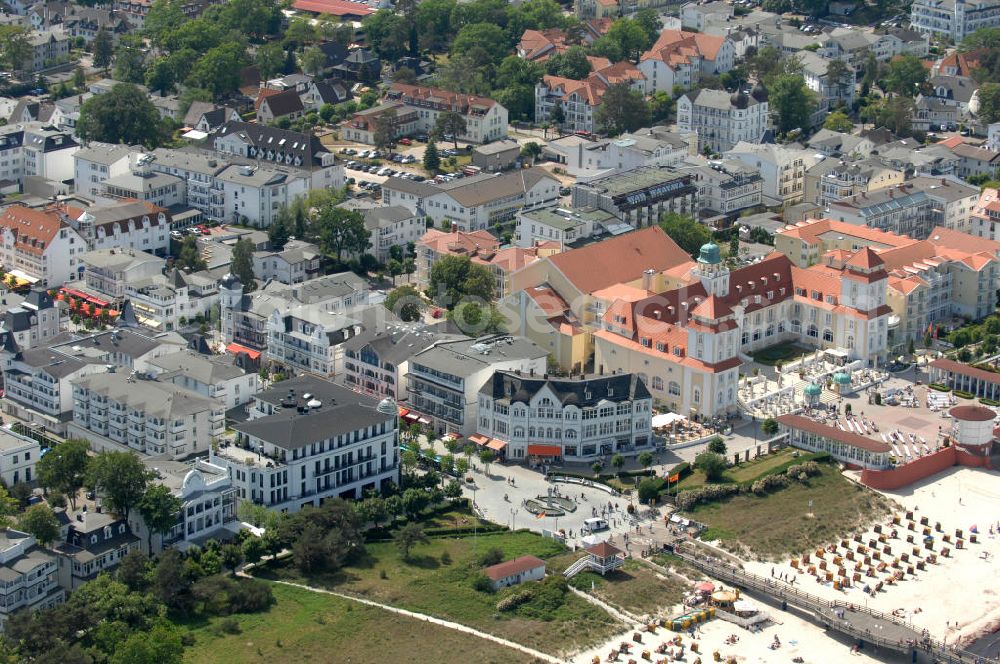 Binz from the bird's eye view: Blick auf Mehrfamilienhhäuser / Appartementhäuser und dem Hotel Travel Charme Kurhaus im Ostseebad / Seebad Binz an der Strandpromenade auf der Insel Rügen - Mecklenburg-Vorpommern MV. View onto blocks of flats / apartment houses and the Hotel Travel Charme Kurhaus in the Baltic sea spa / beach resort Binz on the isle / island Ruegen - Mecklenburg-Western Pomerania.