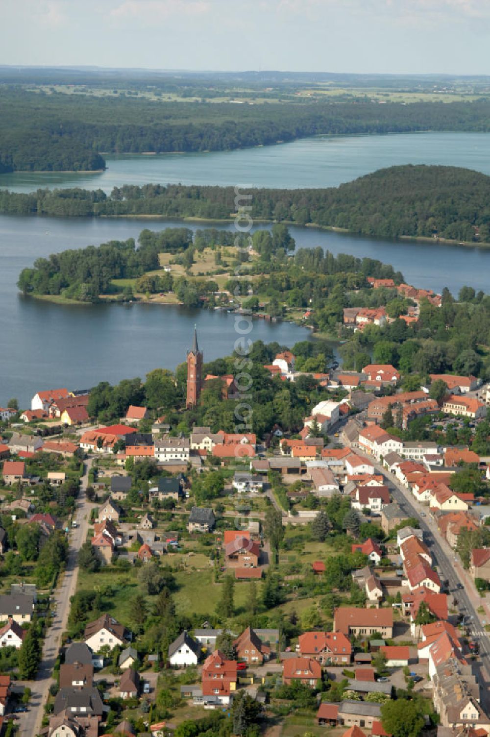 Feldberg from above - Blick über die Stadt Feldberg mit der Halbinsel Amtswerder im Haussee und dem See Breiter Luzin - Mecklenburg-Vorpommern MV. View over the townscape Feldberg with the peninsula Amtswerder in the lake Haussee and the lake Breiter Luzin - Mecklenburg-Western Pomerania.