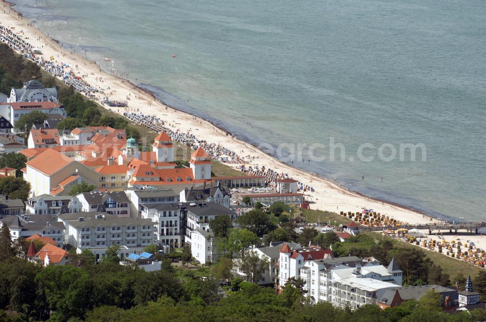 Aerial image Binz - Blick über Mehrfamilienhhäuser / Appartementhäuser und dem Hotel Travel Charme Kurhaus im Ostseebad / Seebad Binz an der Strandpromenade auf den Strand der Ostsee auf der Insel Rügen - Mecklenburg-Vorpommern MV. View over blocks of flats / apartment houses and the Hotel Travel Charme Kurhaus in the Baltic sea spa / beach resort Binz onto the Baltic Sea beach on the isle / island Ruegen - Mecklenburg-Western Pomerania.