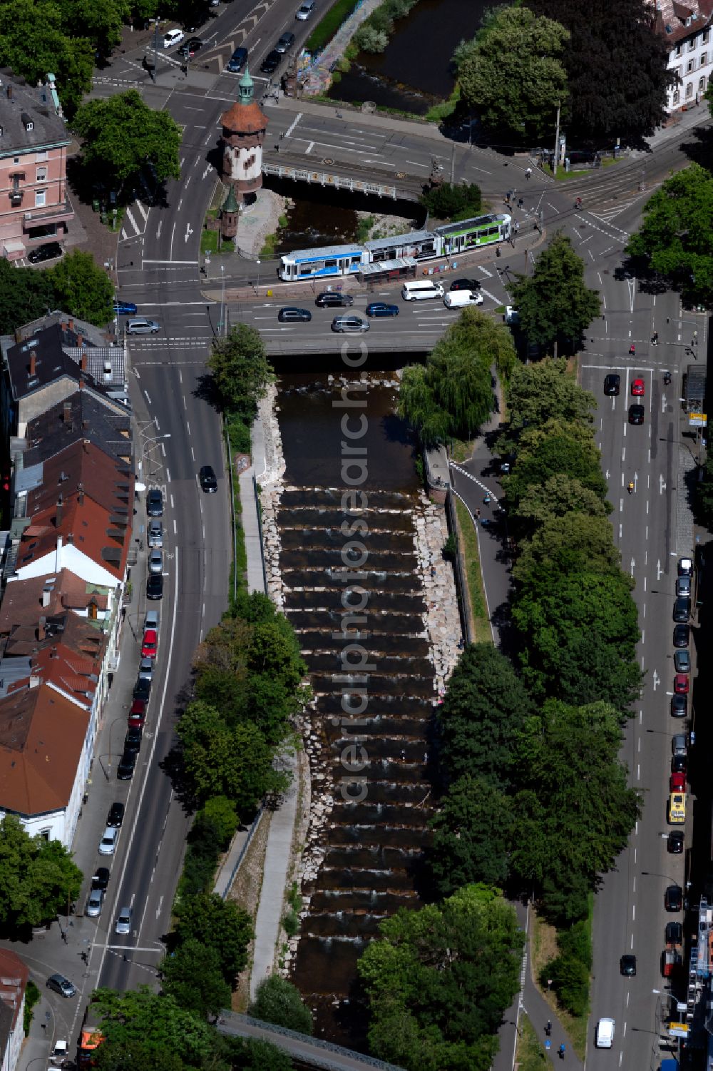 Freiburg im Breisgau from the bird's eye view: City view along the course of the river Dreisam with water stairs and the bridges Greiffeneggbruecke and Schwabentorbruecke as well as the Freiburger Tuermchen in Freiburg im Breisgau in the state Baden-Wuerttemberg, Germany