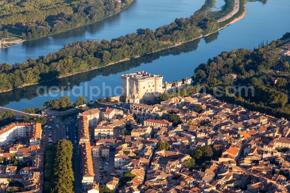 Tarascon from above - City view on the river bank of the river Rhone with castle Chateau de Tarascon in Tarascon in Provence-Alpes-Cote d'Azur, France